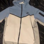 Sky blue and white nike tech